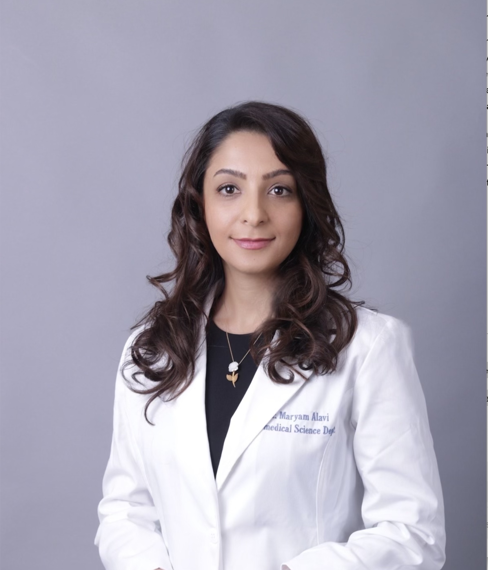 Dr. Maryam Alavi in a laboratory coat